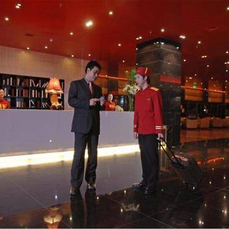 Gloria Plaza Hotel Kangqiao Шанхай Интерьер фото