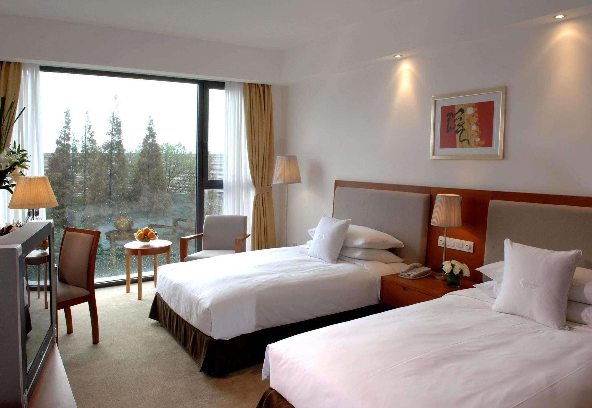 Gloria Plaza Hotel Kangqiao Шанхай Экстерьер фото